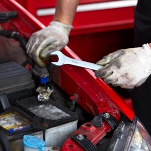 Auto Repair Mechanic with Wrench Fixing A Car in Cheektowaga, NY